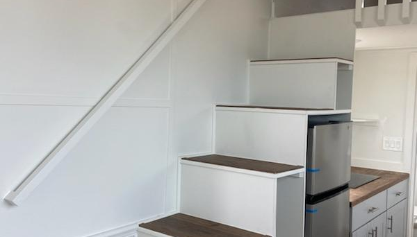 The Nest tiny house rental Bedroom Loft Stairs Tiny Town Orlando the Nest tiny house rental Bedroom Loft Stairs