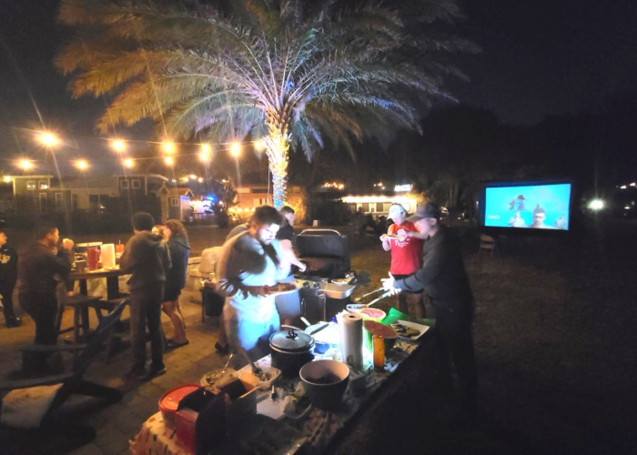 Fire pit gathering and casual seating during Tiny Town Orlando community event Fire pit gathering and casual seating during Tiny Town Orlando community event