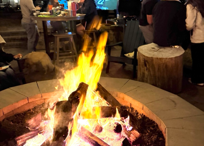 Community Super Bowl watch party at Tiny Town Orlando under palm trees and string lights Community Super Bowl watch party at Tiny Town Orlando under palm trees and string lights