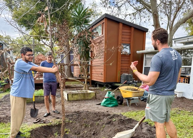 Community volunteers installing garden beds at Tiny Town Orlando Community volunteers installing garden beds at Tiny Town Orlando