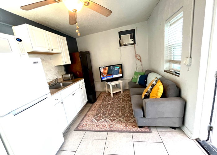 Studio interior ceiling fan window AC compact living Studio interior ceiling fan window AC compact living