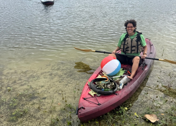 Tiny Town Orlando residents enjoying lakefront community living near Lake Fairview with outdoor social gathering Tiny Town Orlando residents enjoying lakefront community living near Lake Fairview with outdoor social gathering