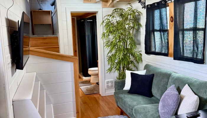 Affordable tiny house in Orlando with open-concept living room and full kitchen inside The Dragonfly tiny home Affordable tiny house in Orlando with open-concept living room and full kitchen inside The Dragonfly tiny home