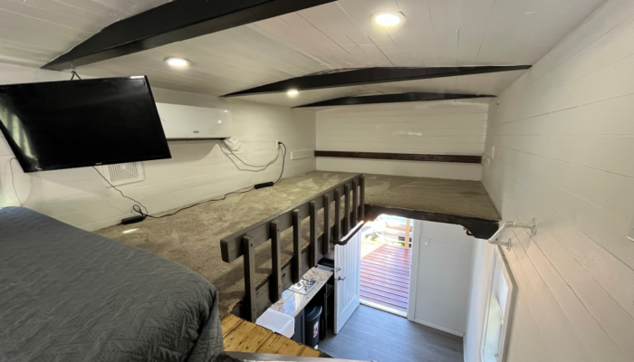 Loft area queen and space in tiny house rental Loft area queen and space in tiny house rental